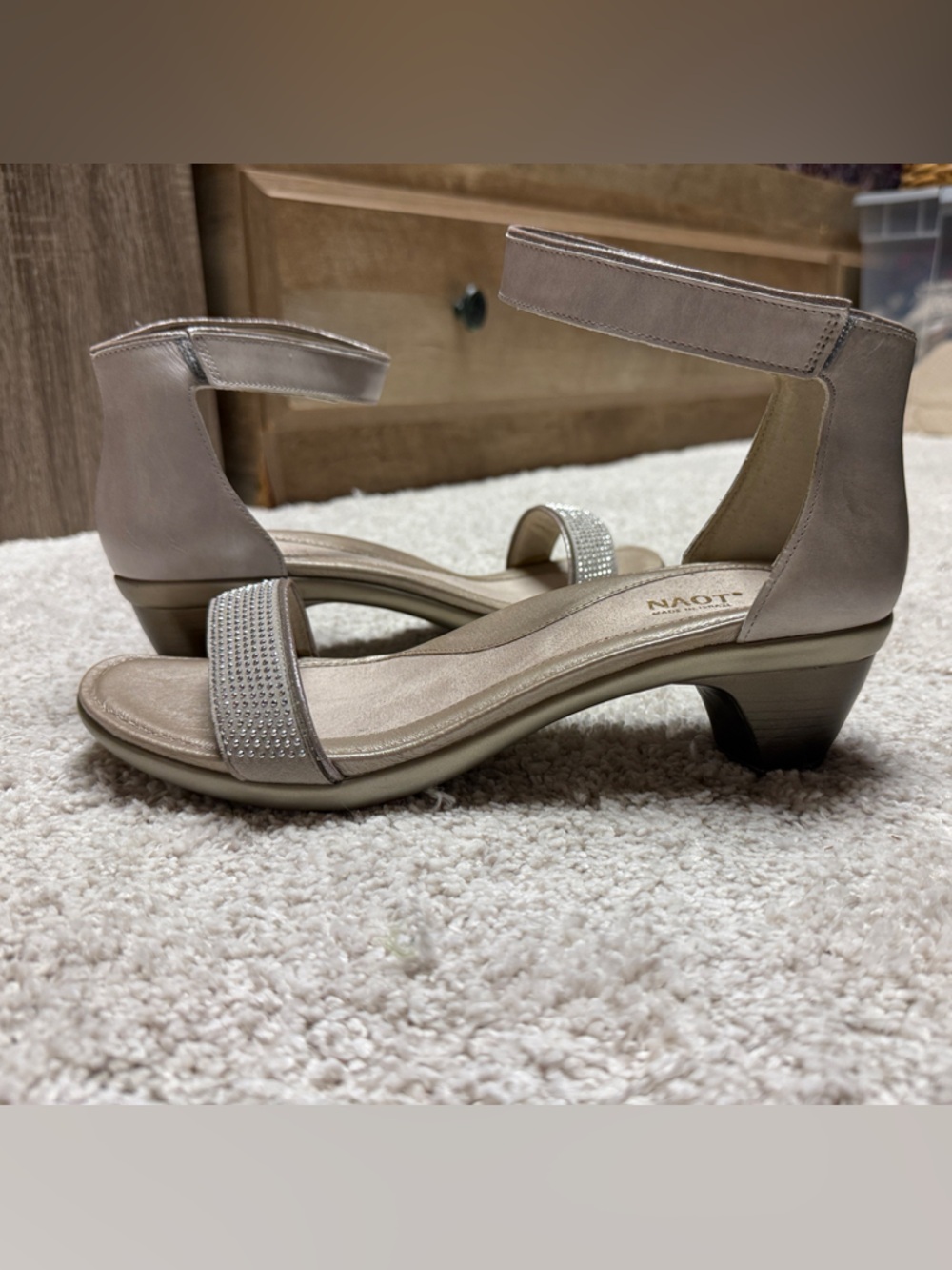 Naot Metallic Taupe Ankle-Strap Sandals Rhinestone Front Band
New. Never worn.